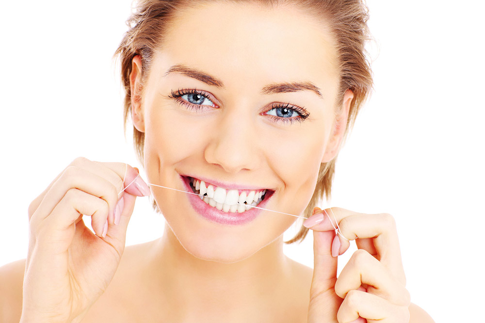 Hilo dental con invisalign